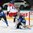 MINSK, BELARUS - MAY 24: Finland's Pekka Rinne #35 attempts to make he save while Vladimir Sobotka #17 of the Czech Repubilc leaps out of the way and Atte Ohtamaa #5 looks on during semifinal round action at the 2014 IIHF Ice Hockey World Championship. (Photo by Andre Ringuette/HHOF-IIHF Images)

